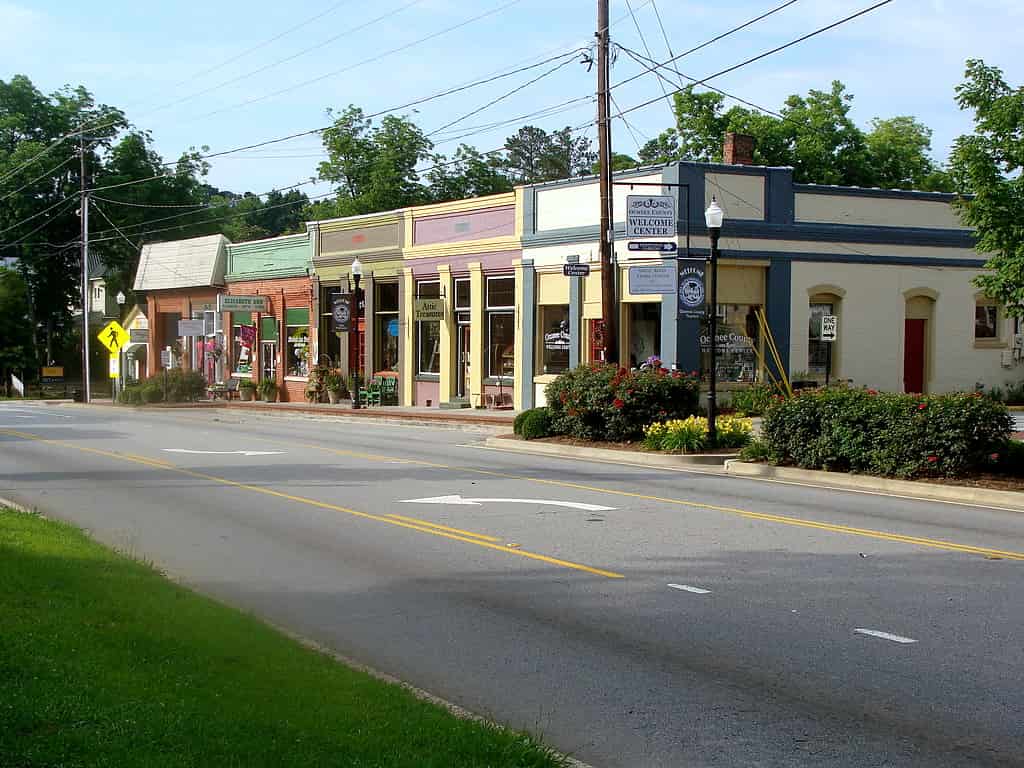 Storefronts along Main Street in downtown Watkinsville, Georgia, seen from the road
